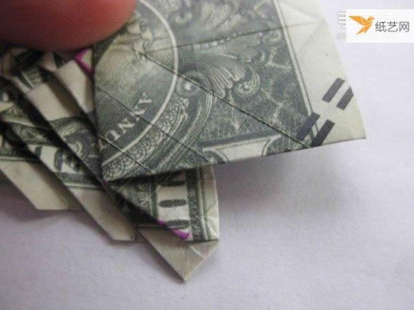 How to fold paper carp using dollars