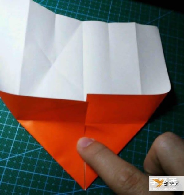 Detailed explanation of the manual method of folding a paper kingfisher tutorial.