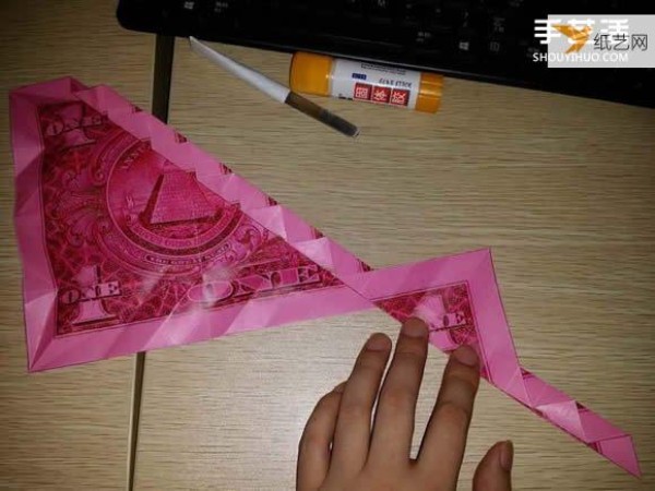 How to fold paper carp using dollars