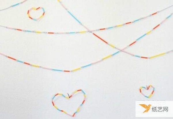 Use toddler straws to craft beautiful colorful holiday decorations