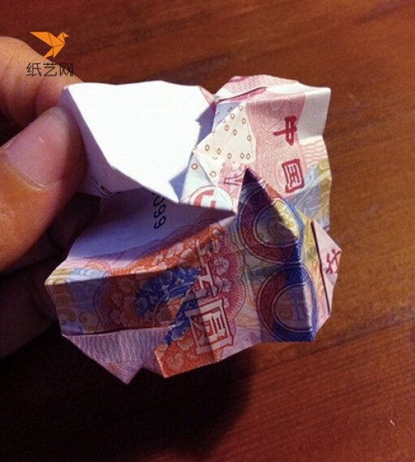 Illustrated tutorial on folding roses from RMB | How to fold roses from RMB | How to fold roses from hundred-yuan banknotes