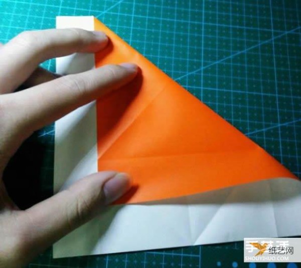 Detailed explanation of the manual method of folding a paper kingfisher tutorial.