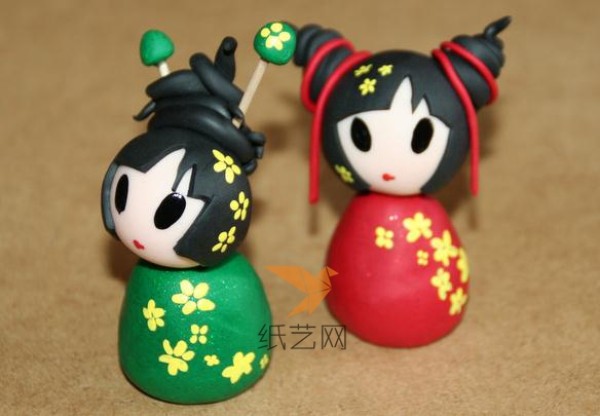 A pair of Chinese dolls made from ultra-light clay as a New Year gift