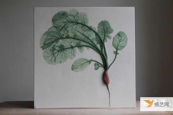 Add flowers, plants and vegetables to clay to create beautiful plant fossil tiles