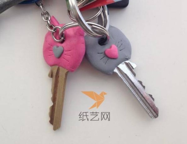 Kitten shaped key decoration made from clay