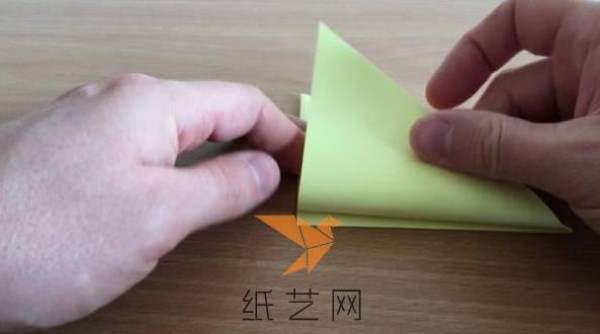 A step-by-step tutorial on how to make an origami peace dove