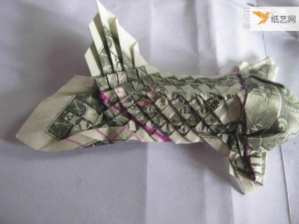 How to fold paper carp using dollars