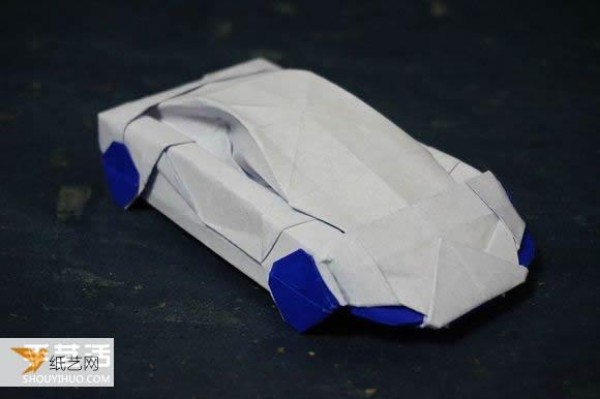 Illustrated tutorial that comprehensively demonstrates the method of hand-folding a paper sports car