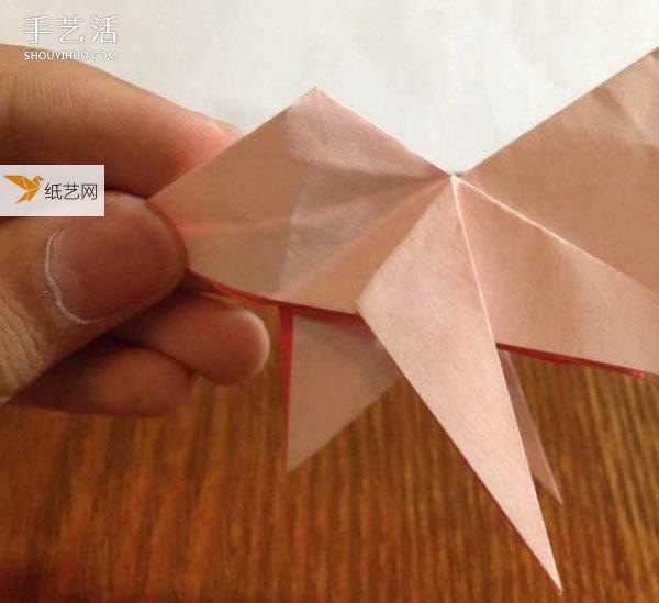 Illustration of how to fold a three-dimensional poodle using origami