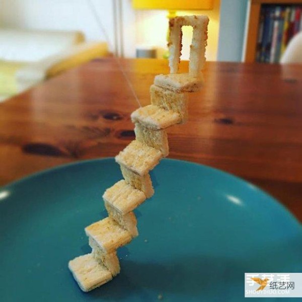 The bread carvings made by the loving father make his allergic daughter very happy to eat them