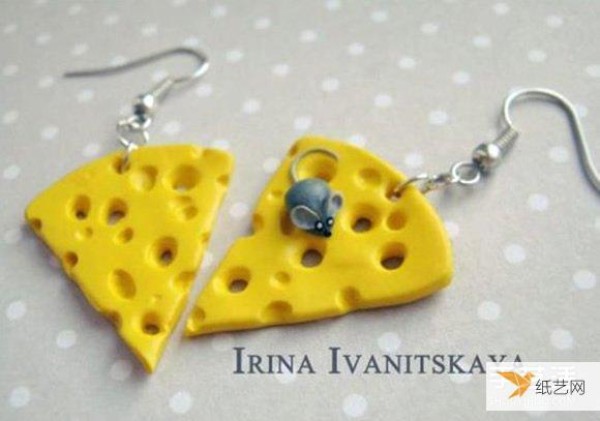 Personalized cheese earrings made from ultra-light clay. There are mice stealing food.