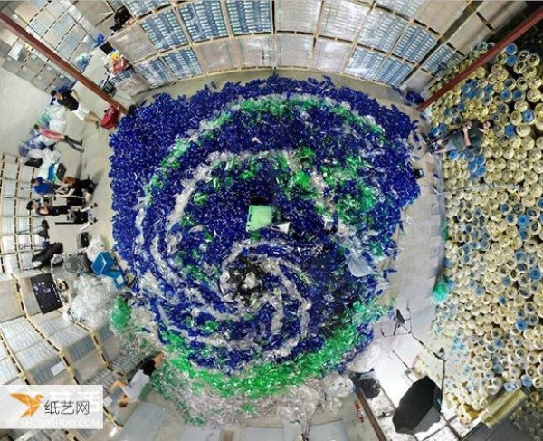 Showing an ocean of 10,000 plastic bottles and using mermaids to explain environmental protection