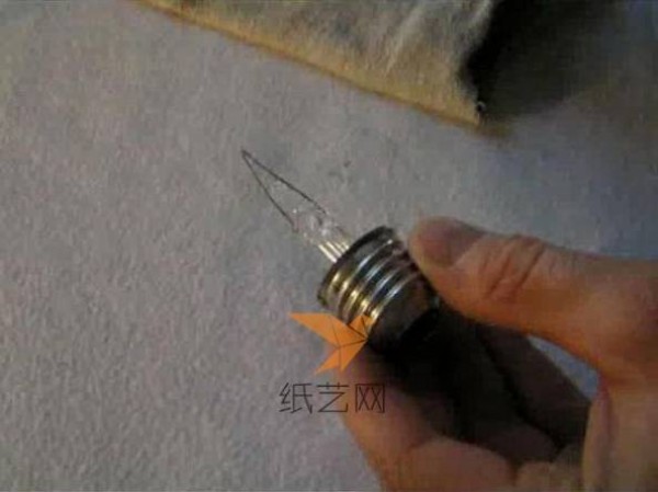 DIY tutorial for using waste incandescent light bulbs to make a boat inside a light bulb