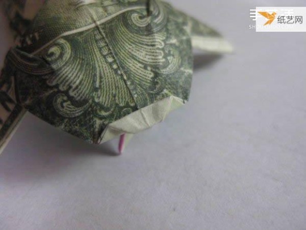 How to fold paper carp using dollars