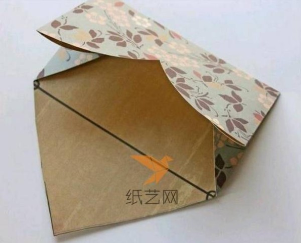 Origami envelope tutorial when folded into an envelope and opened into a heart shape