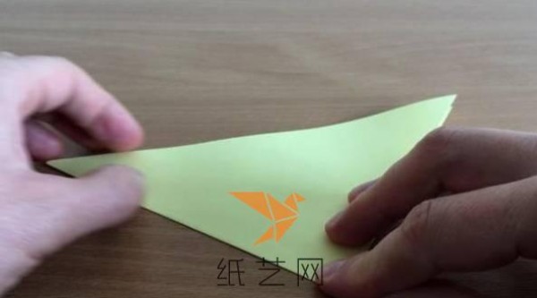 A step-by-step tutorial on how to make an origami peace dove