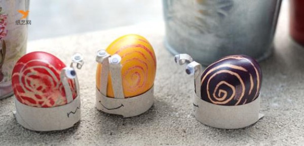 Use toilet paper tubes to make creative little snail Easter eggs