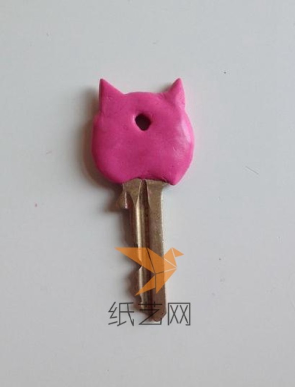 Kitten shaped key decoration made from clay