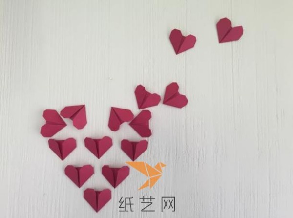 Origami hearts combined into beautiful heart-shaped wall stickers for Valentines Day decoration