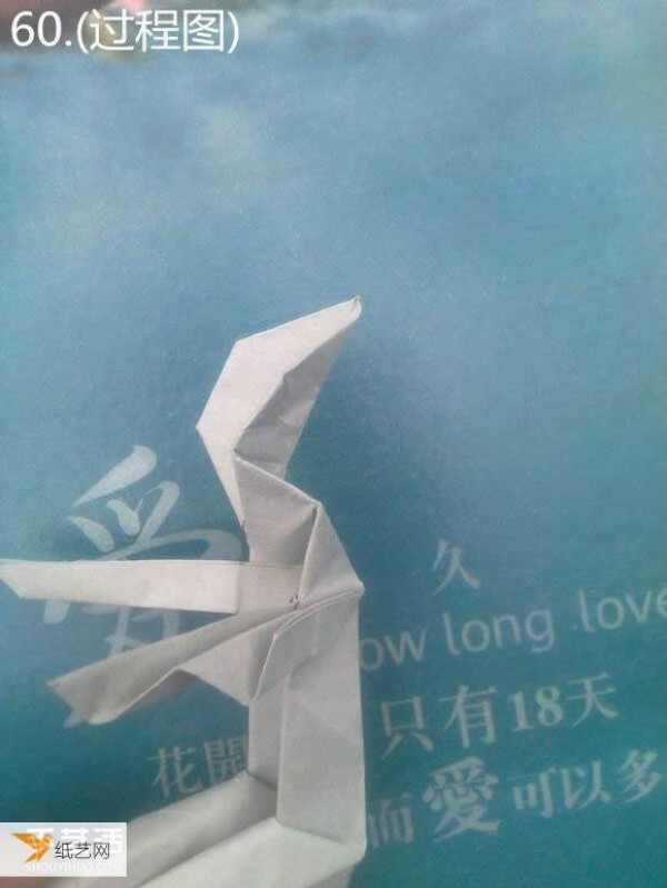 Detailed illustration of a sculpture of a pensive thinker using origami