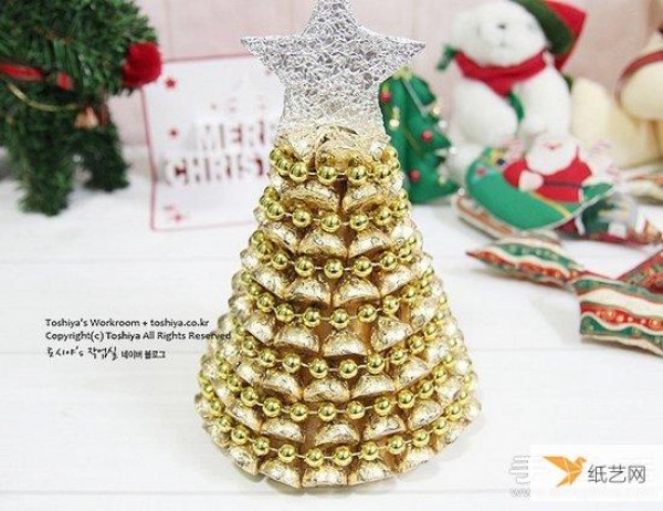 A personalized and super festive Christmas tree made entirely of chocolate