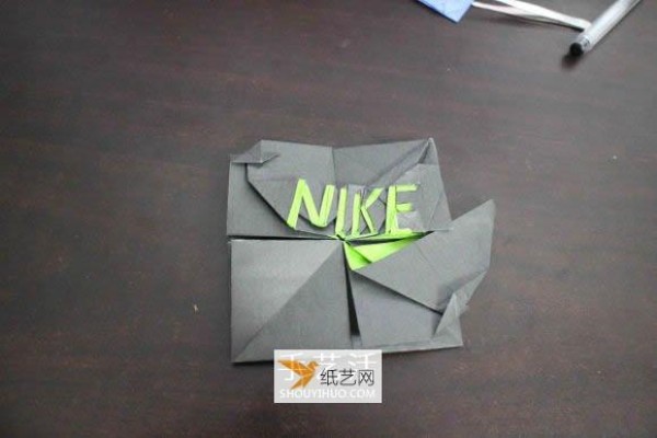 How to fold the Nike logo using origami