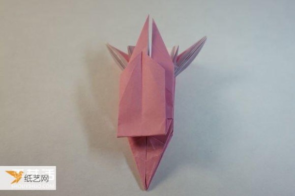 Illustrated step-by-step tutorial for girls using origami to fold something that looks complicated