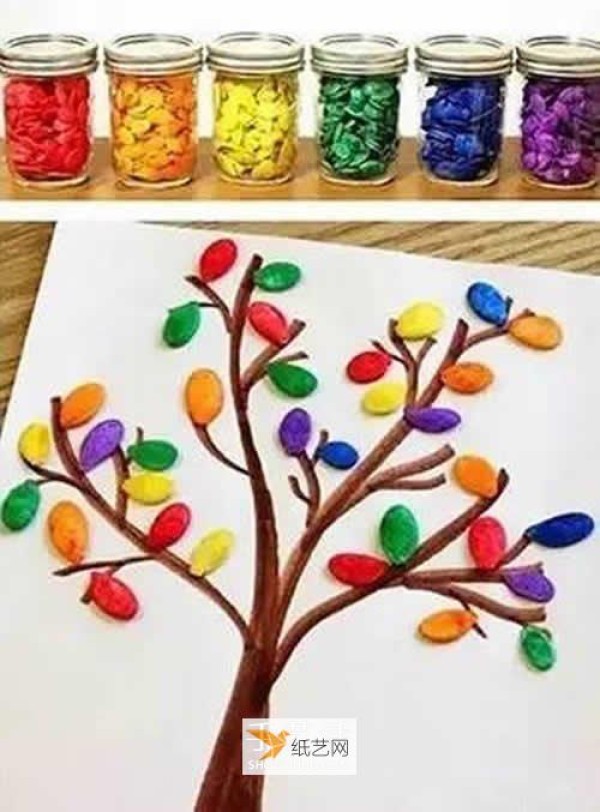 Kindergarten children make handmade tree collage using pumpkin seeds