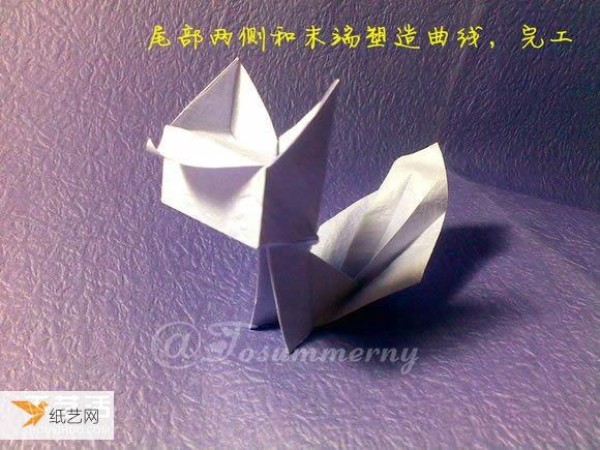 Share an illustrated tutorial on using origami to fold a flame-tailed square cat.