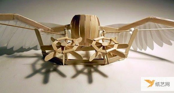 dynamic mechanism made from popsicle sticks and mylar