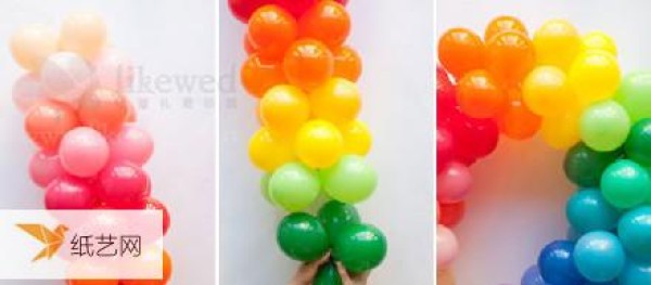 Use balloons to match colors to create a beautiful rainbow door