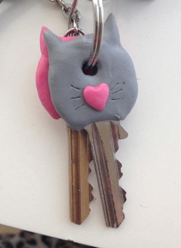 Kitten shaped key decoration made from clay