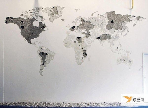 Make a personalized world map by tapping on the blank wall