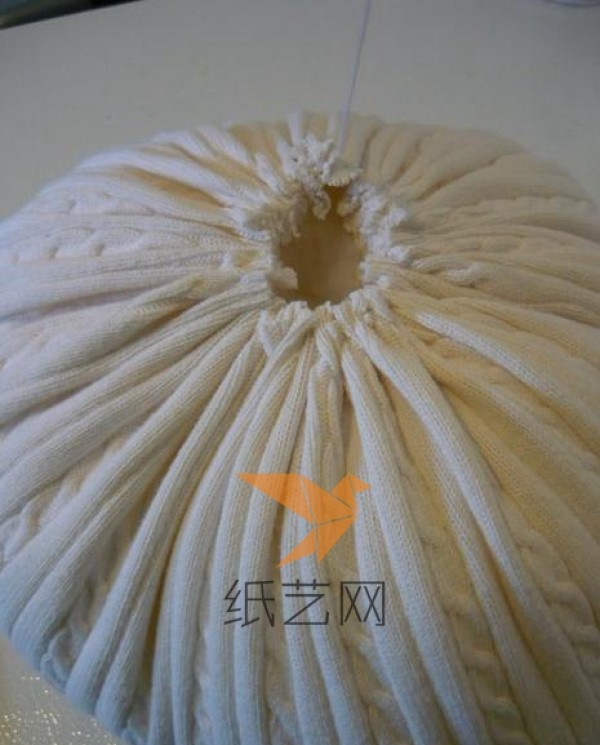 Tutorial on reusing old sweaters to make Halloween pumpkins