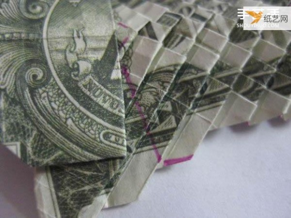 How to fold paper carp using dollars