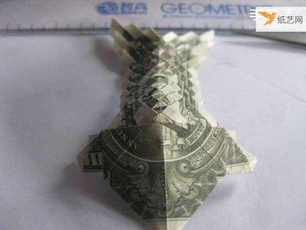 How to fold paper carp using dollars