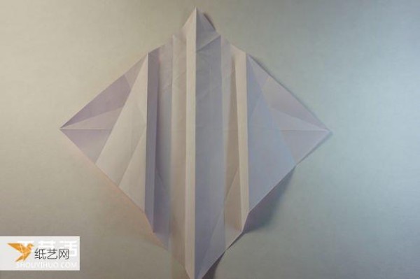 Illustrated step-by-step tutorial for girls using origami to fold something that looks complicated