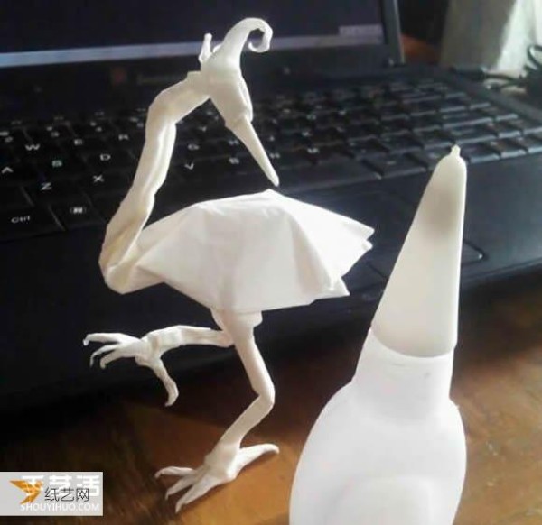 Detailed method and illustrated steps of folding a three-dimensional egret using origami