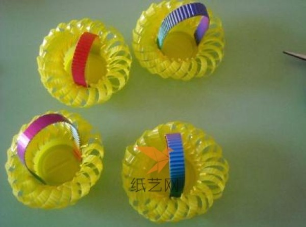 Childrens handicraft: using plastic cup waste to make a cute little basket