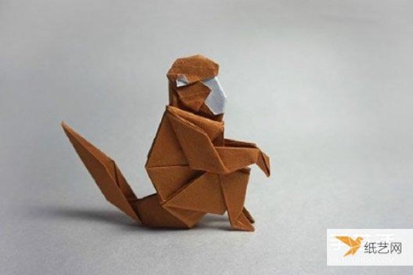 Illustrated tutorial on how to fold a squatting three-dimensional origami monkey