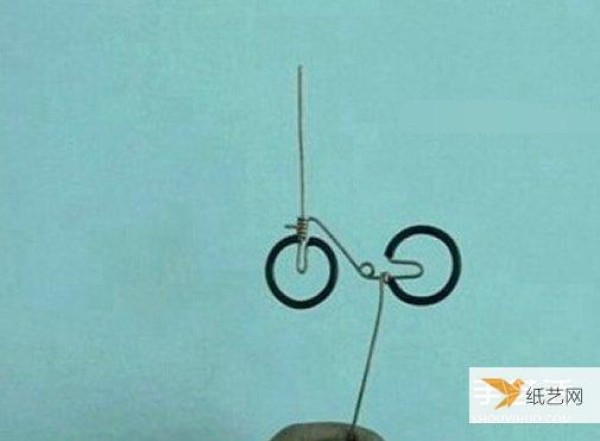 Illustrated tutorial on how to make a bicycle by hand using copper wire