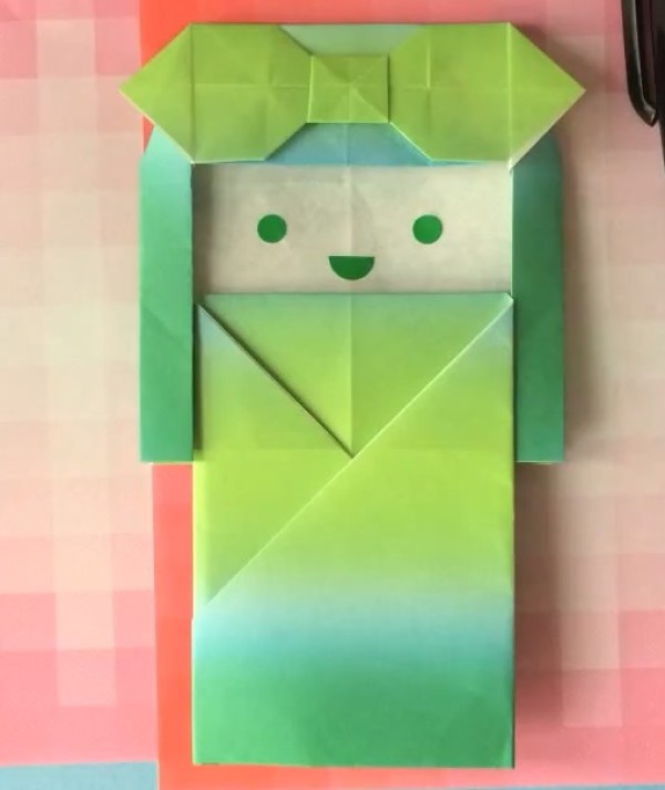 Tutorial on how to make origami Japanese doll bookmarks