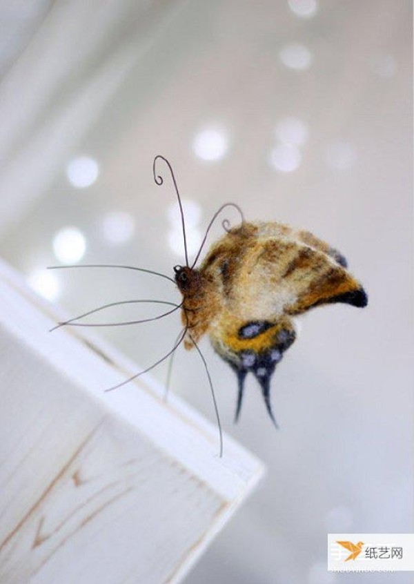 Appreciate the pictures of beautiful realistic and natural butterflies made of wool felt that look like living creatures