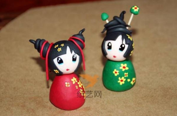 A pair of Chinese dolls made from ultra-light clay as a New Year gift