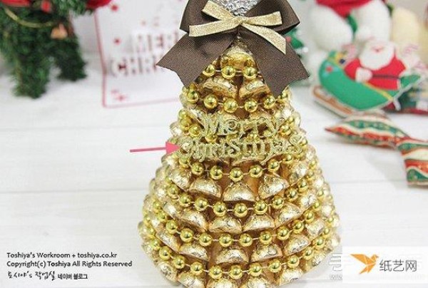 A personalized and super festive Christmas tree made entirely of chocolate