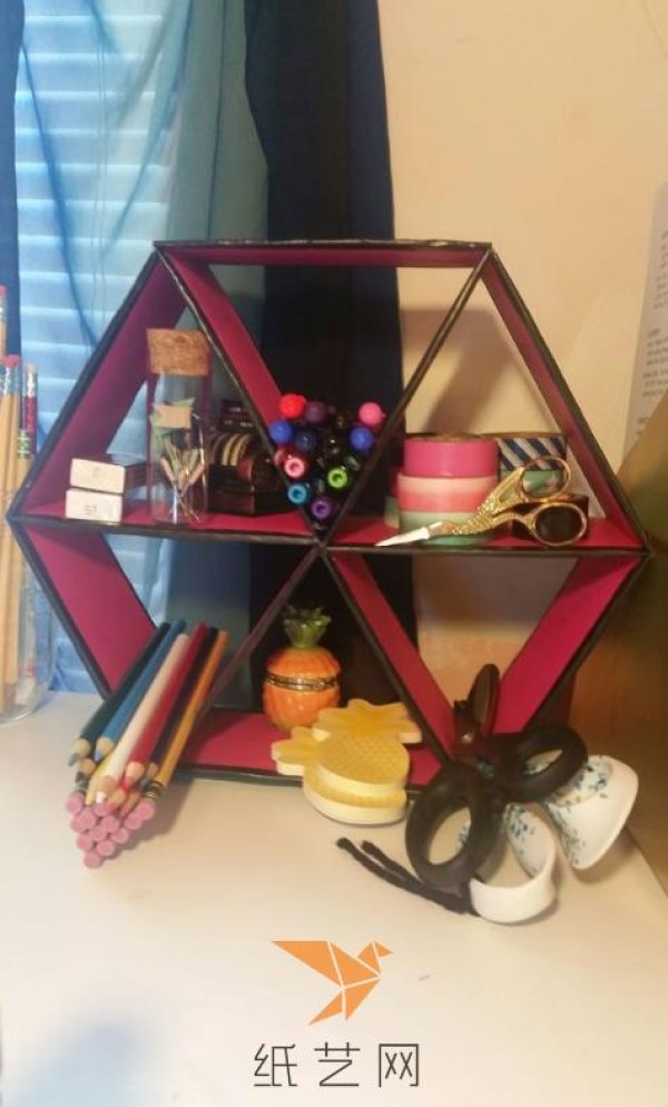 Hexagonal storage rack made from old cardboard waste