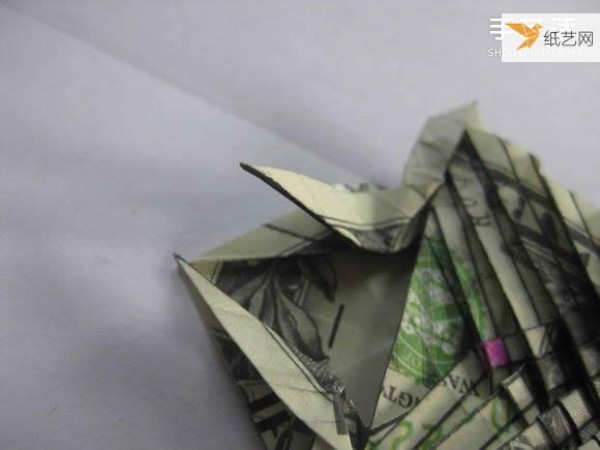 How to fold paper carp using dollars