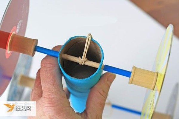 Simple and beautiful step-by-step illustration of the homemade rubber band powered car