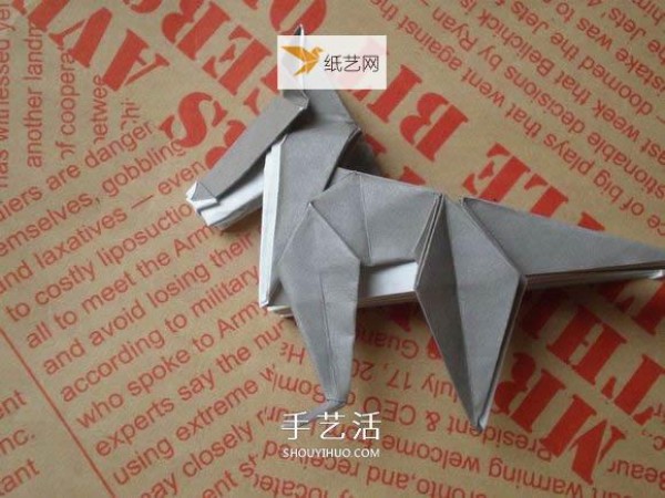 Illustration of hand-folding cute puppies using origami