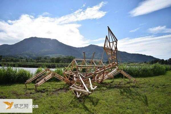 Using useless straw to create large sculptures at Japans Rice Straw Art Festival